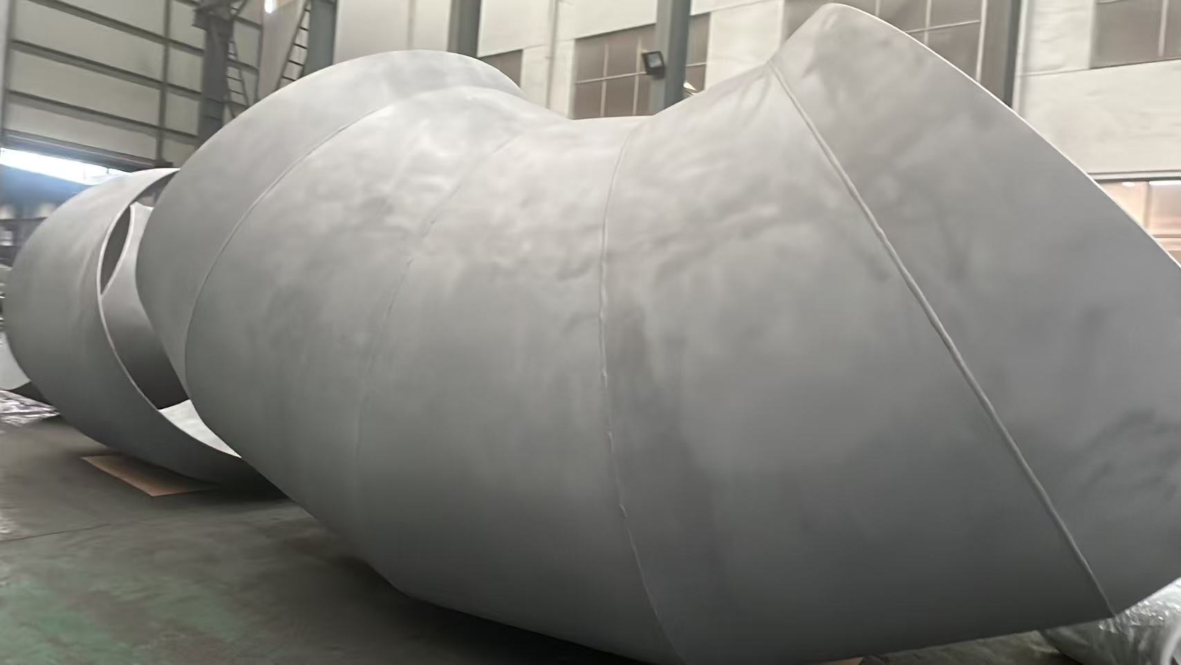 90 graders albue DN2438×8 succesfuldt fremstillet